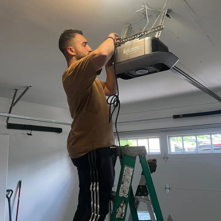 Why Professional Garage Door Opener Repair Prevents Rail Bowing